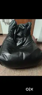 Black bean bag with beans inside - comfortable for office and home