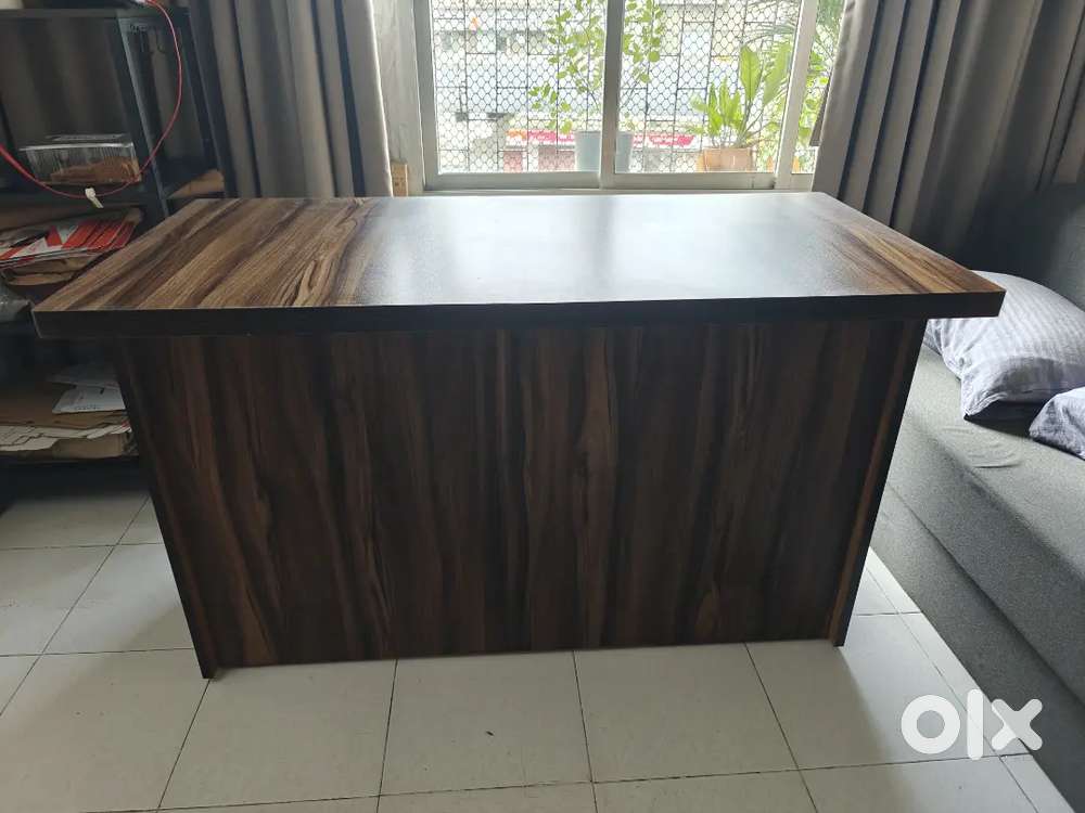 4 feet wide - office cum study table.