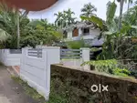 A 3bhk house with 18 cent land located near NH 66 Bypass Erenhikkal