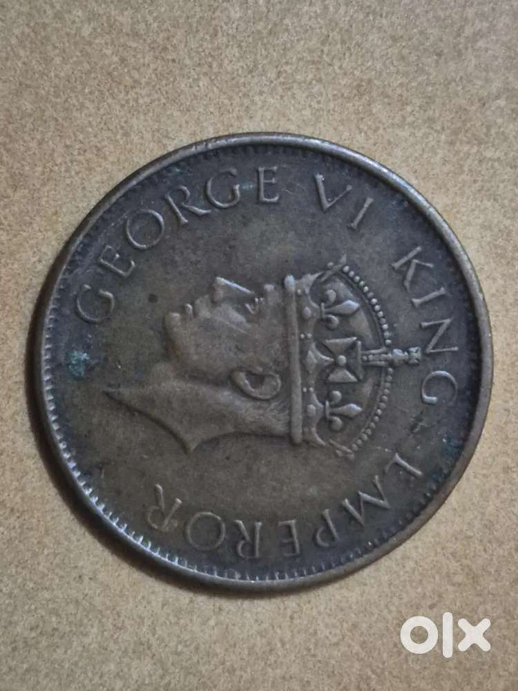 Old british one anna coin