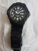 CASIO 5125 MRW 200H Black Day & Date wrist watch.