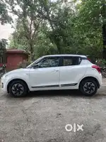 Maruti Suzuki Swift LXI Optional-O, 2019, Petrol
