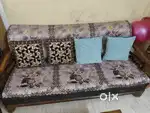 Wooden sofa in working condition