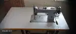 Brand new Sewing Machine with motor. Negotiable