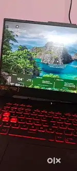 ASUS TUF F15 RTX 4060 WITH A 6 FAN COOLING PAD
