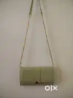 LADIES SLING PURSE/BAG (NEW)