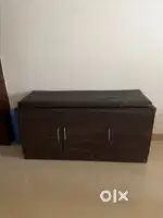 Wooden cabinet with seating