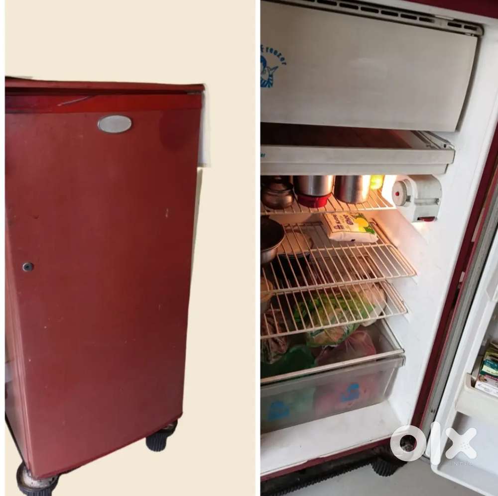 For sale refrigerator ofWhirlpool Company,   Its  Red in color.