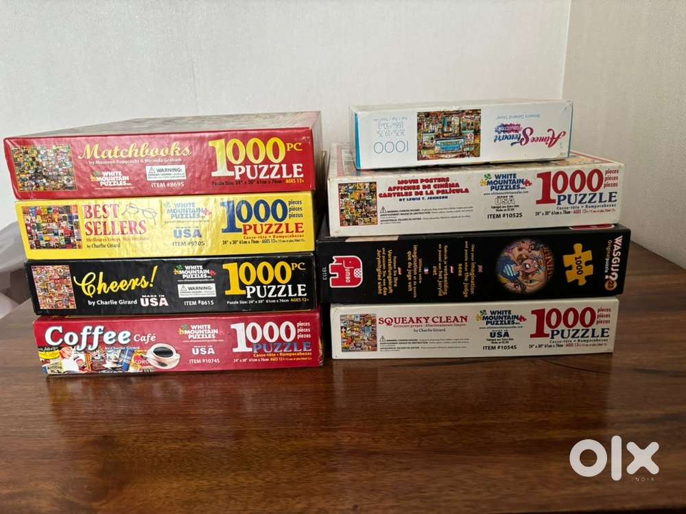 1000 piece Made in USA jigsaw puzzles. 8 sets.