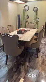 The dining table is new and in good condition