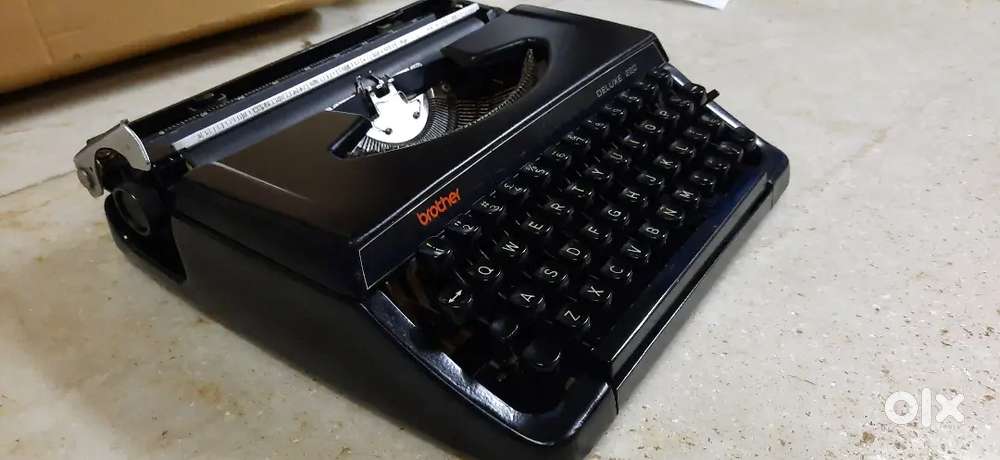 Black Color Brother Company Typewriter with Box working
