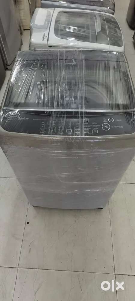 LG washing machine fully automatic top load with warranty and good con