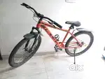 Orange and black hill9 bicycle