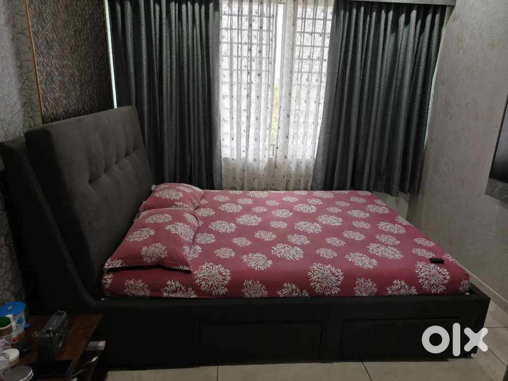 Engineered wood Fabric Upholstred Queen size cot with  storage.