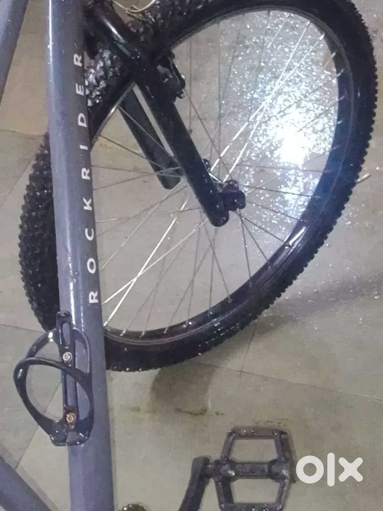 Rockrider cycle grey colour new condition 6 months old with seatcover