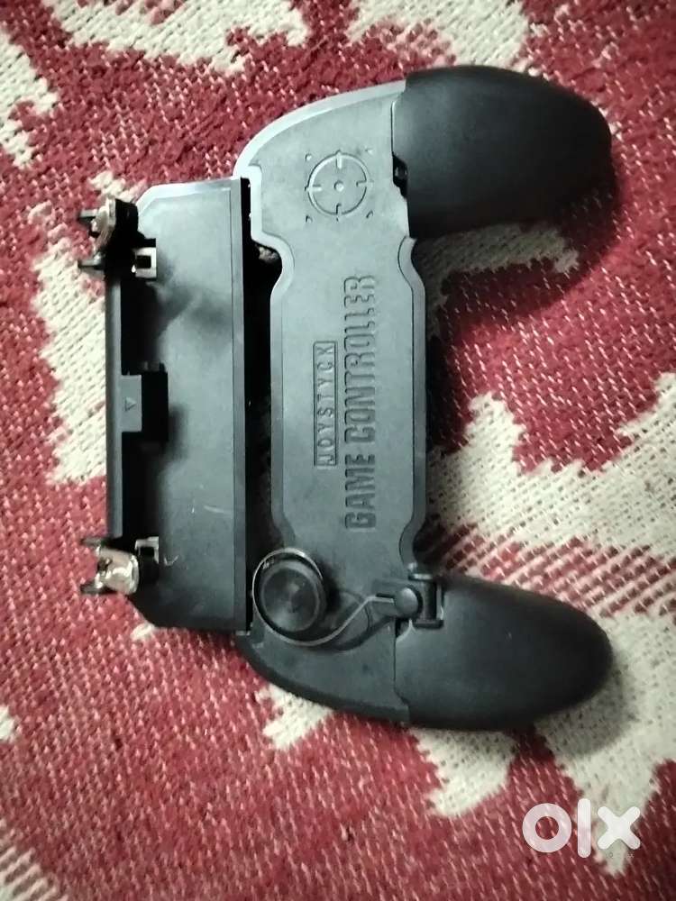 This is phone holder for free fire and bgmi with trigger