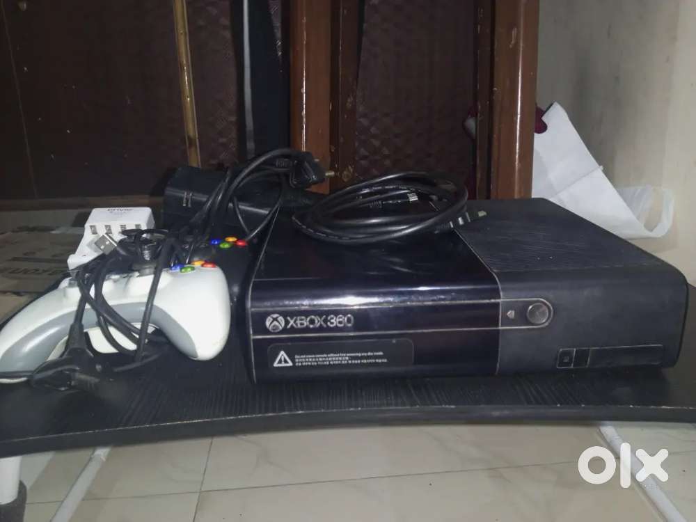 XBOX 360e 500GB + 1TB HARD DRIVE