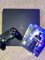 Ps4 1 TB with remote and 2 games in good quality