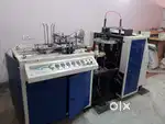Paper cup making machine.