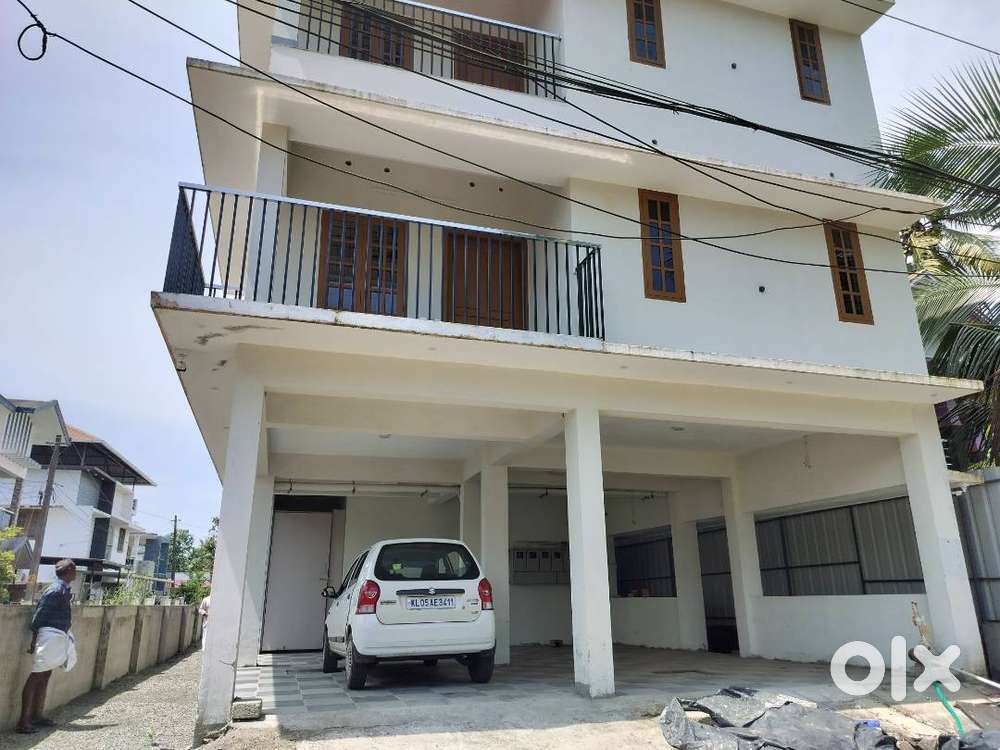 2 BHK brand new apartment with car parking in Kottayam town area.