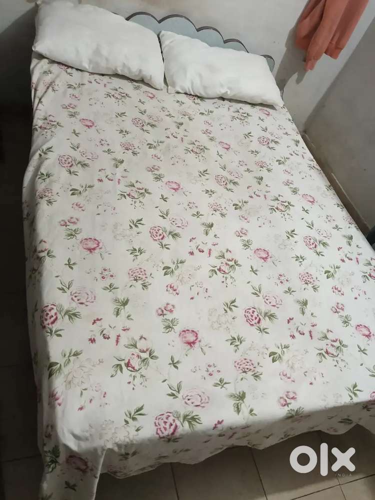 Wooden bed with mattress, size 4x6.2 good condition With pellow