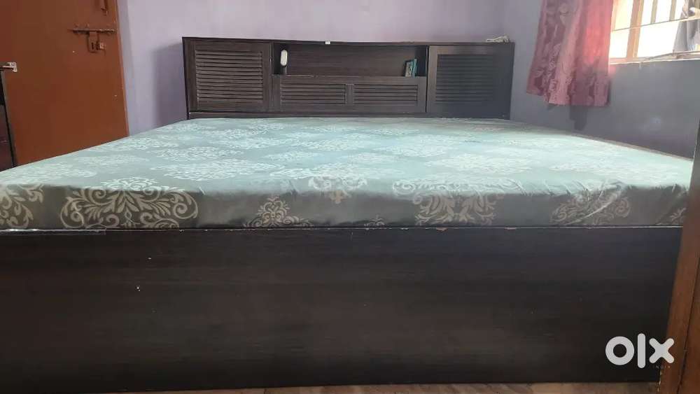 A King Sized bed with mattress