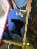 Boxing gloves and boxing helmet