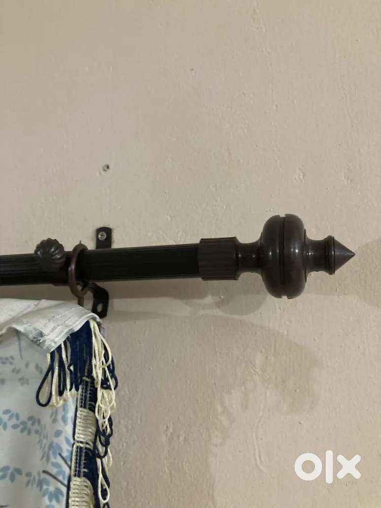 Curtain and curtain holder