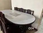 Dining table with carved pillers