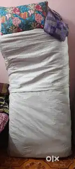 New Mattress non used with two pillows and stitched Bed cover
