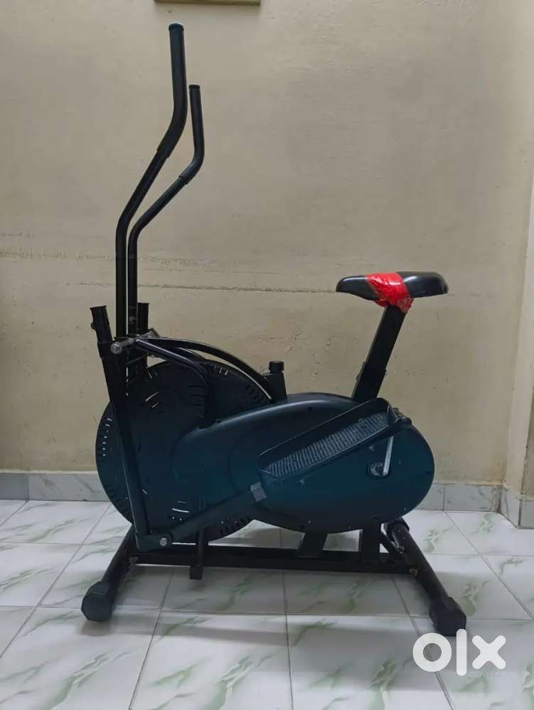 Dual action stationary bike