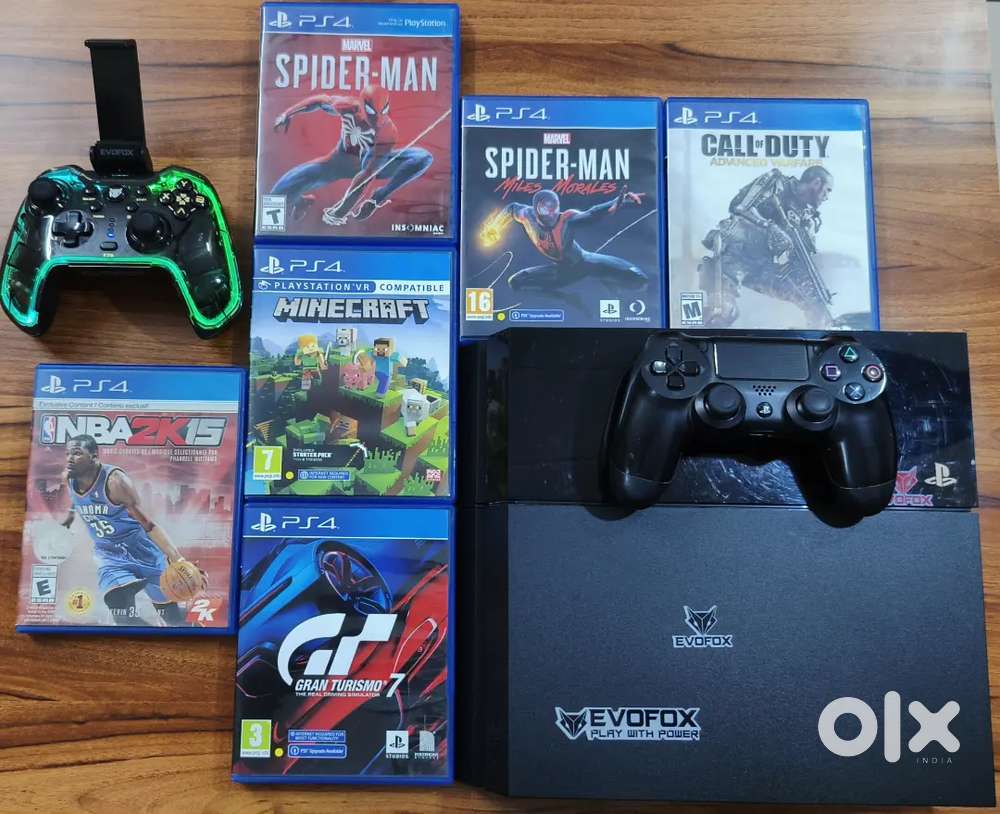 PS4 standard 500GB with original & evo fox controller and 6 CD'S.
