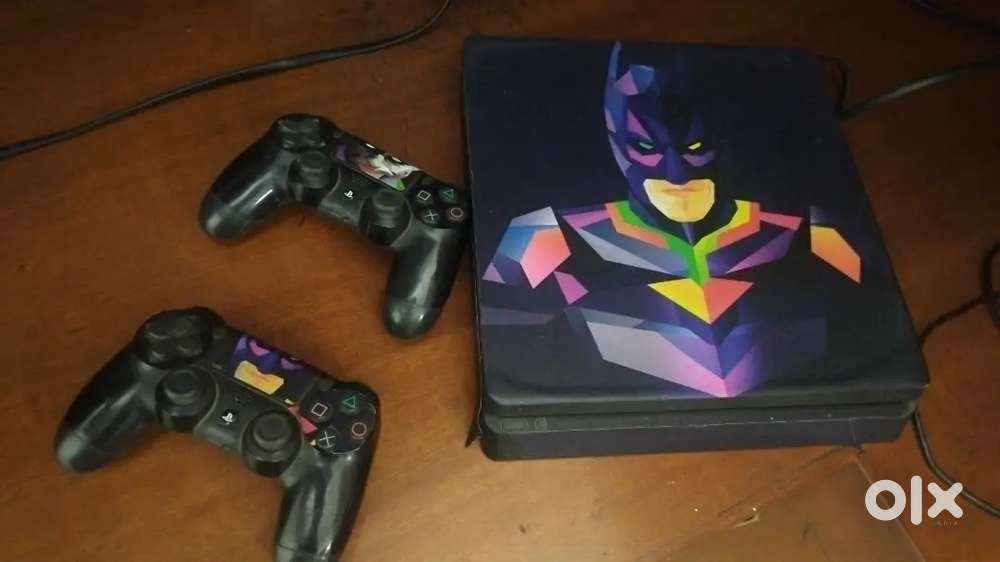PS4 SLIM 1TB + TWO ORIGINAL DUALSHOCK CONTROLLERS.. BEST DEAL 22000/-