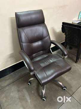 Wooden furnished table with rotating chair