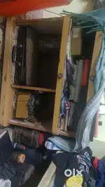 A 6ft beero, laptop computer table and 2 steel cot