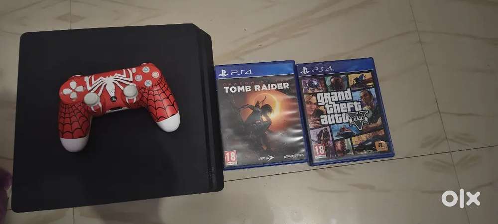 Playstation 4 slim 500 gb with 2 cds and 1 controller new