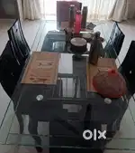 6 seater glass top dining table