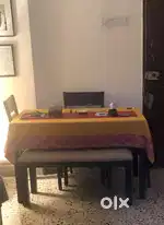 8 seater Sofas, dining table and two steel trunks for sale