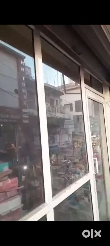 A shop with roof on first floor in main market