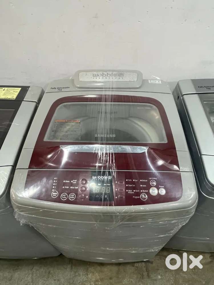Samaung washing machine 7 kg 1 year used with warranty