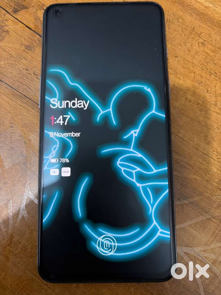 OnePlus Nord 2 5G phone with charging cable and OG box