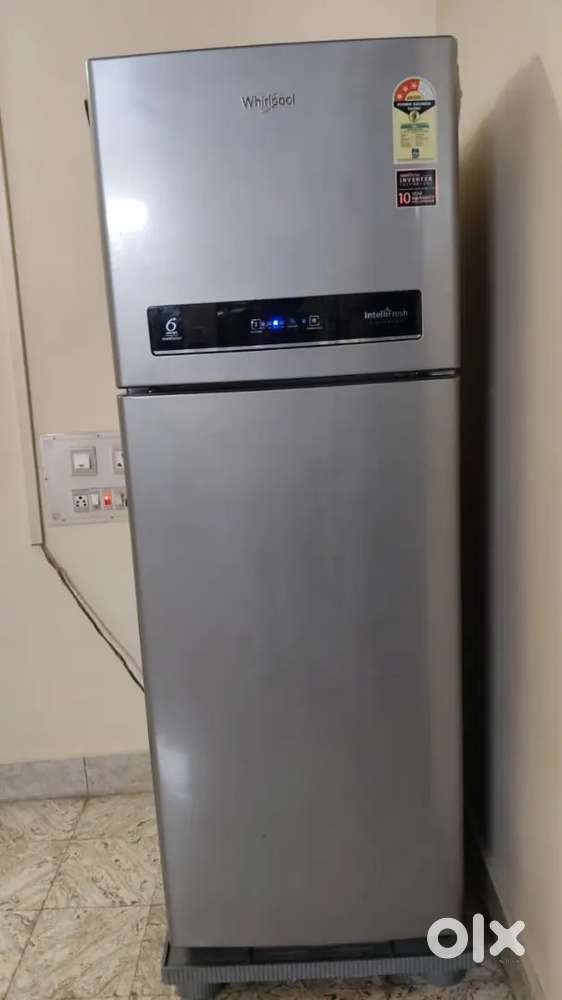 Whirlpool fridge for sale less used 2 doors shifting so changing
