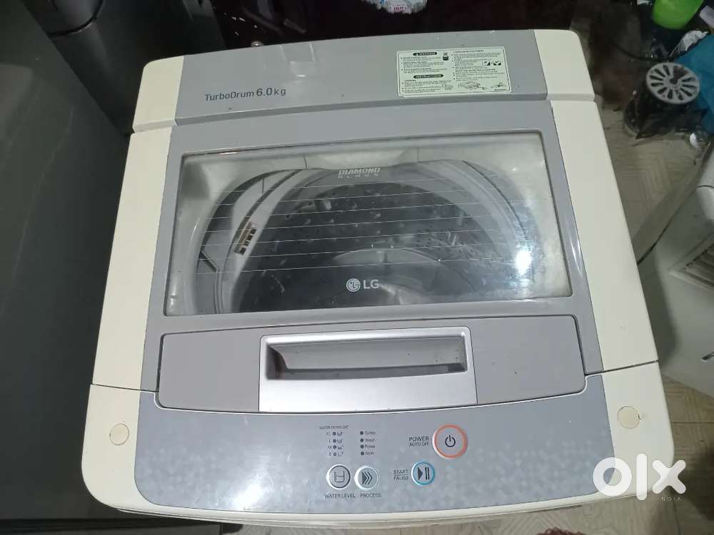 LG AUTOMATIC TOP LOAD WASHING MACHINE
