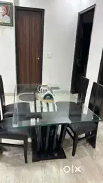 Glass top dining table with 4 chairs very good condition 12 mm glass