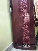 Godrej fridge and iron dinning table with four chair
