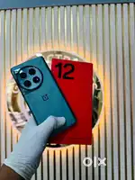 Oneplus 12 (Flowy Emerald) 12l256 GB only 4 months old with warranty