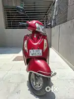 Suzuki Access red 125cc