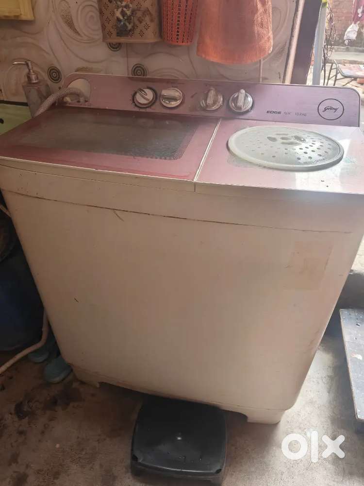 Godrej 10.5 kg semi automatic top load washing machine.