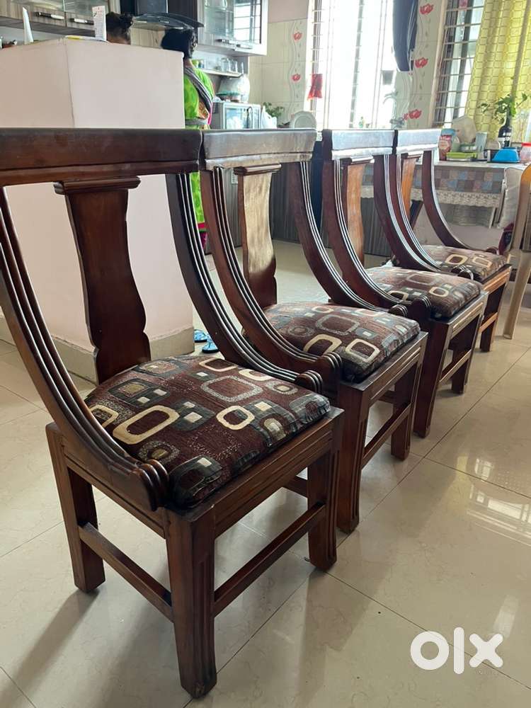 Set of 4 teak wood Dining chairs - great condition