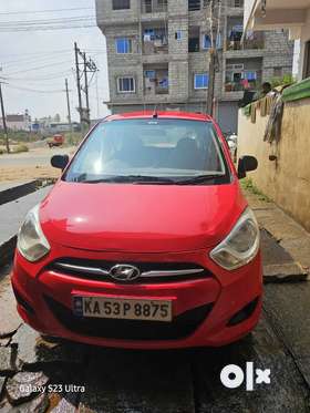 I 10 red colour Urgent sale slightly negotiable